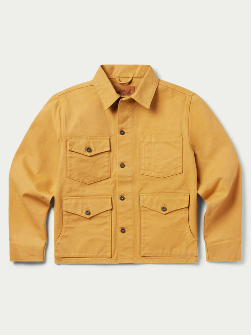Suntan brush jacket with stand collar, two chest pockets, and button front.