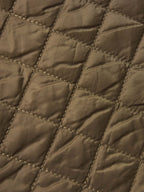 Stone quilted jacket lining with stitched channel panels