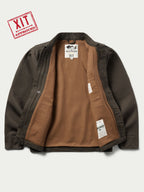 Dark brown canvas jacket interior lining with XIT swing tag