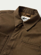 Hickory canvas jacket collar and chest pocket with hidden placket seam