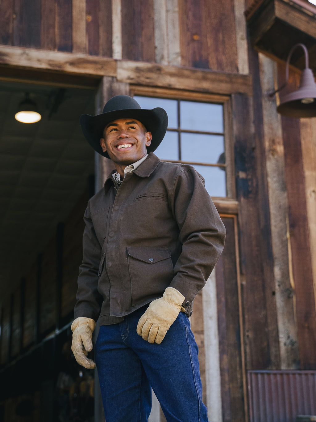 Hickory brown zip canvas jacket worn with long sleeves and chest pocket