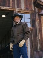 Hickory brown zip canvas jacket worn with long sleeves and chest pocket