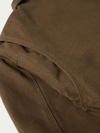 Hickory canvas jacket sleeve cuff with curved pocket flap stitching