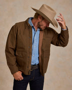 Hickory canvas zip jacket detail on model, collar and front pockets visible