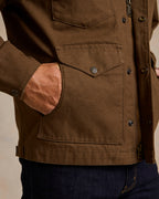 Hickory canvas jacket pocket and snap details with zipper front and panel stitching