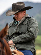 Loden waxed drifter jacket on model, button-front pockets and collar detail