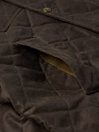RangeWax® jacket close-up of dark brown quilted fabric and seam stitching