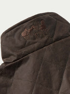RangeWax® jacket detail showing embroidered logo on the hood