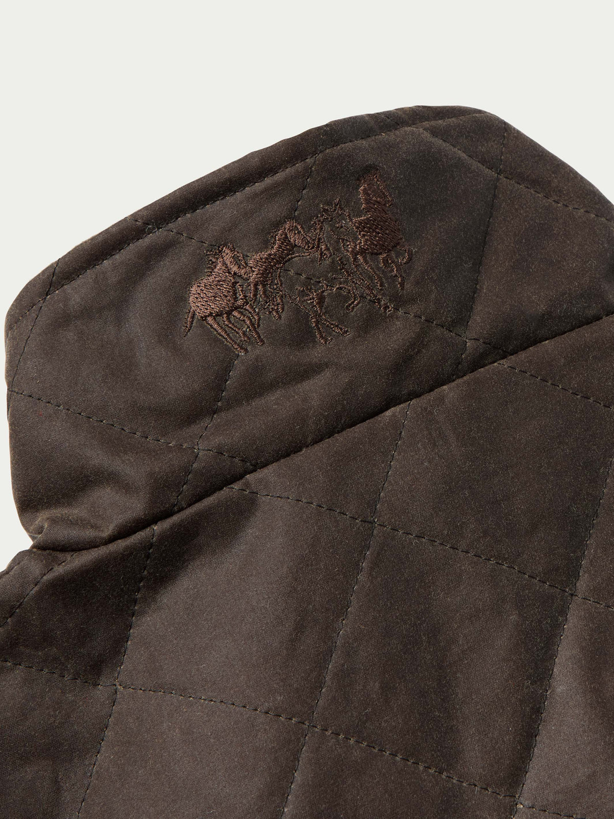 RangeWax® jacket detail showing embroidered logo on the hood