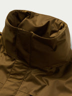 Brown rain jacket collar and front seam details with inner lining