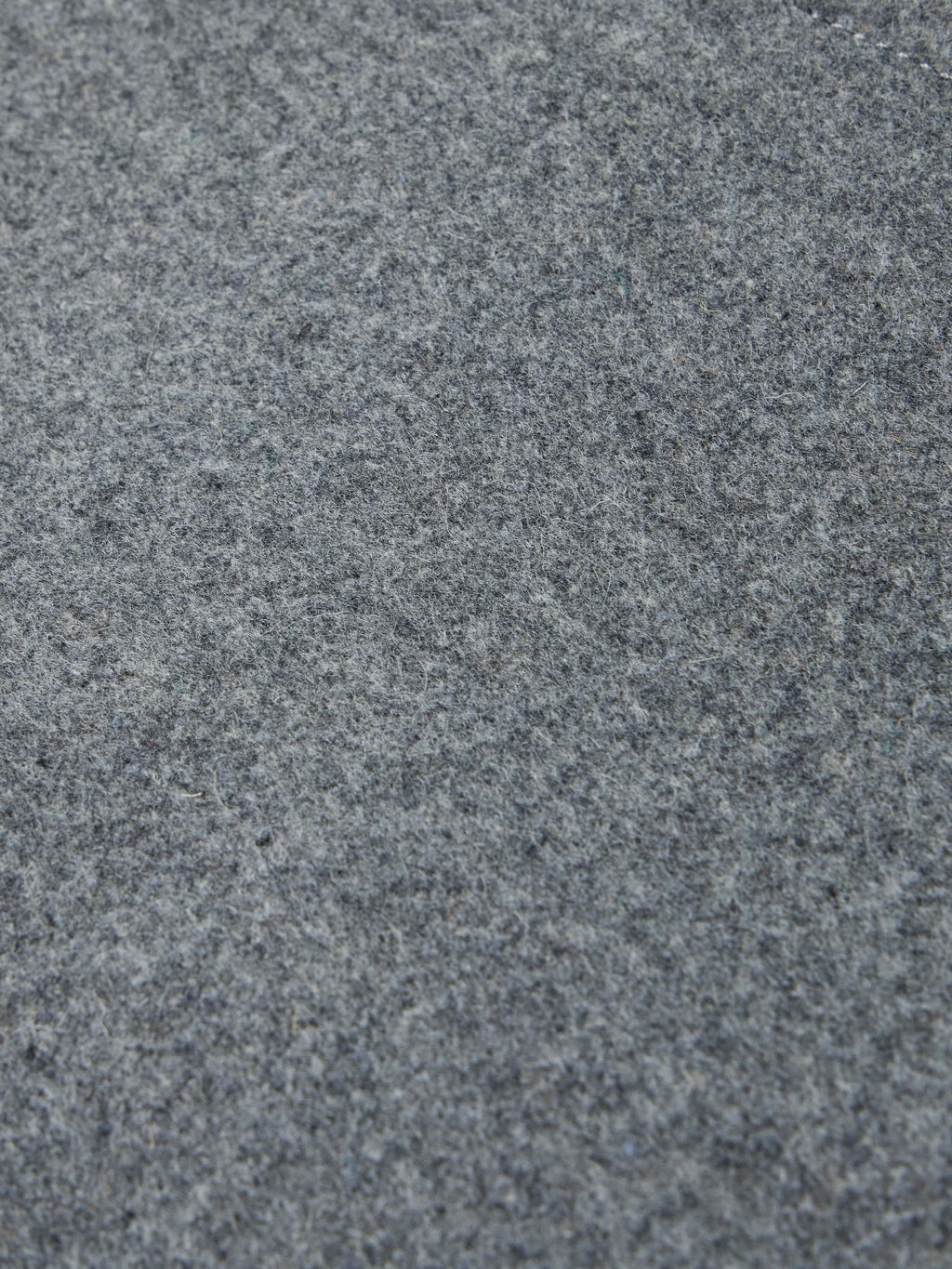 Heather gray wool fabric texture swatch for arena vest.