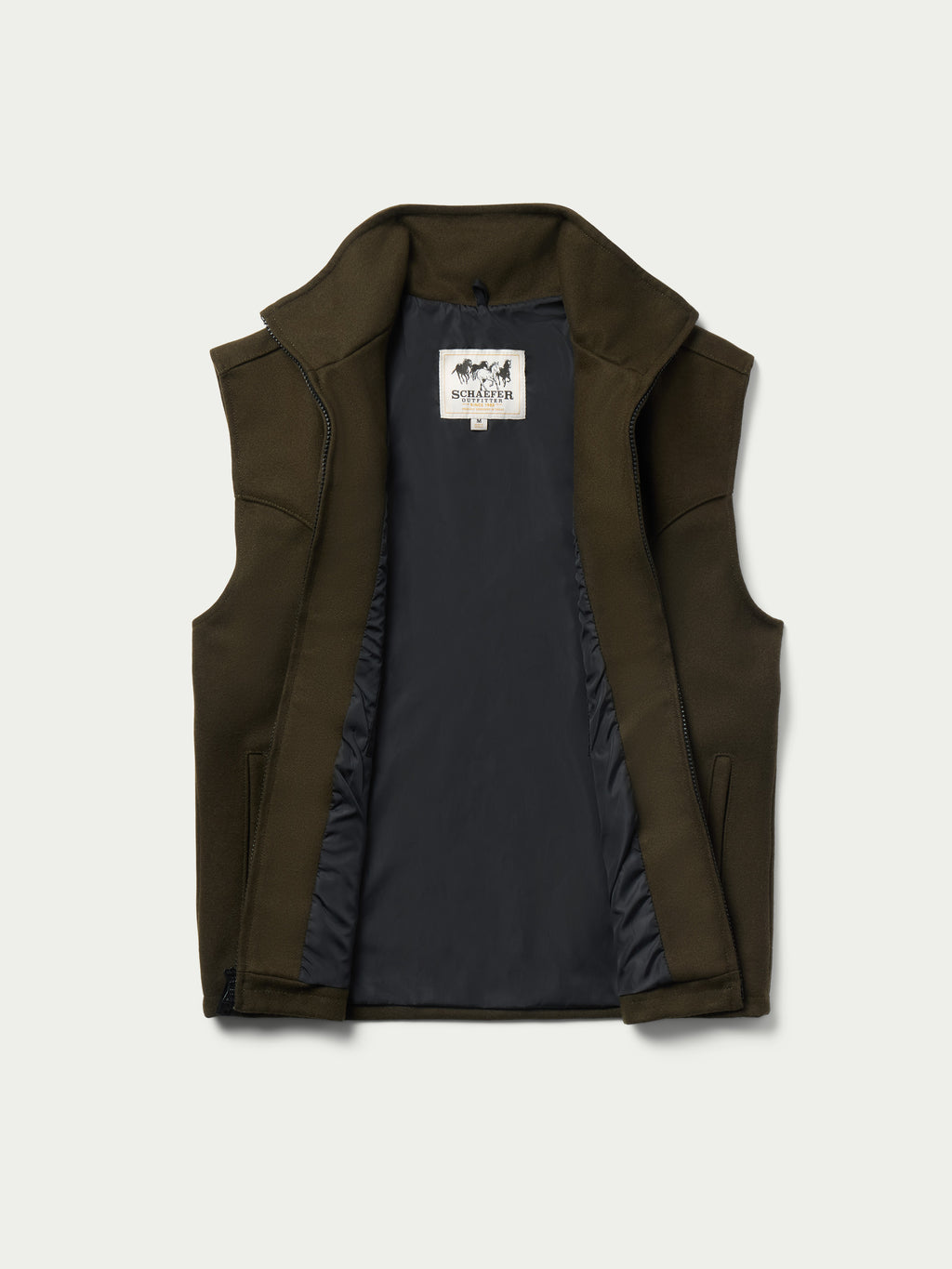 Loden wool arena vest inside view, stand collar and full-zip opening with lining.