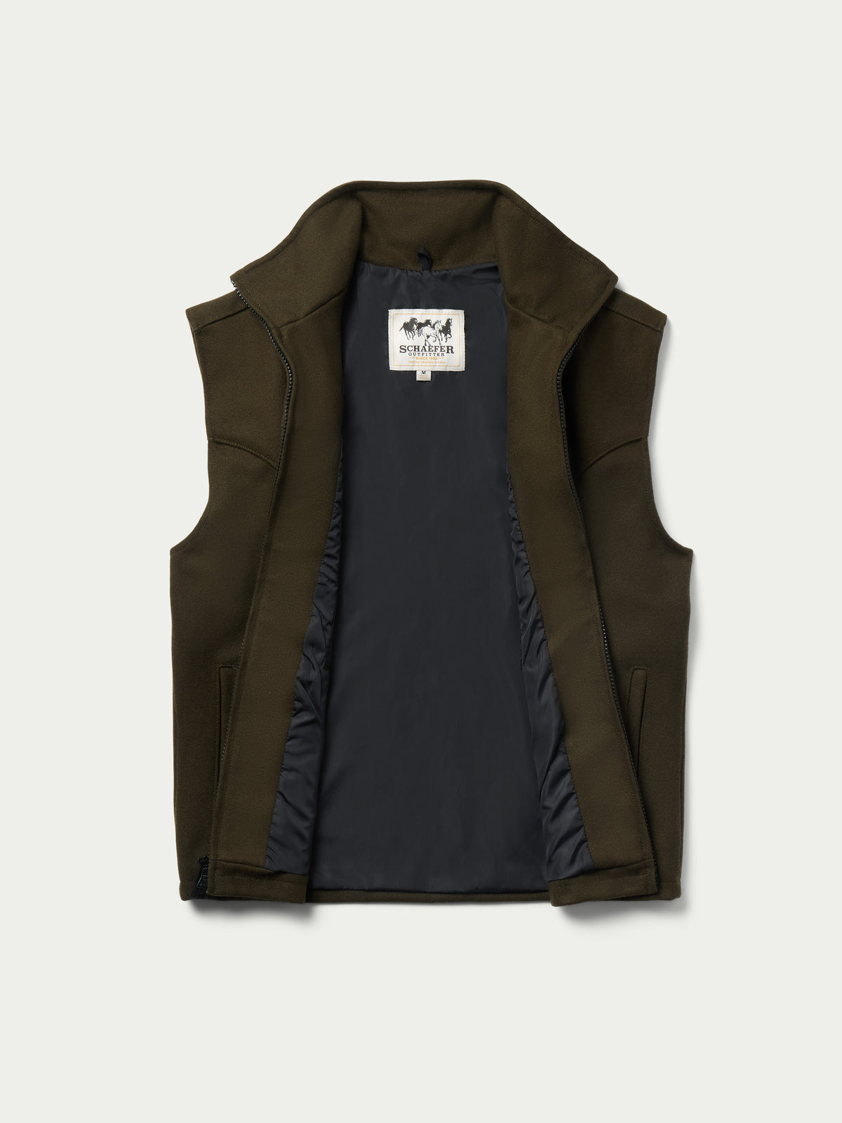 Loden wool arena vest inside view, stand collar and full-zip opening with lining.