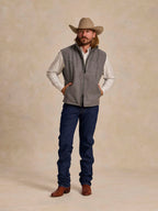Heather gray wool vest with stand collar and full zipper, front view over jeans