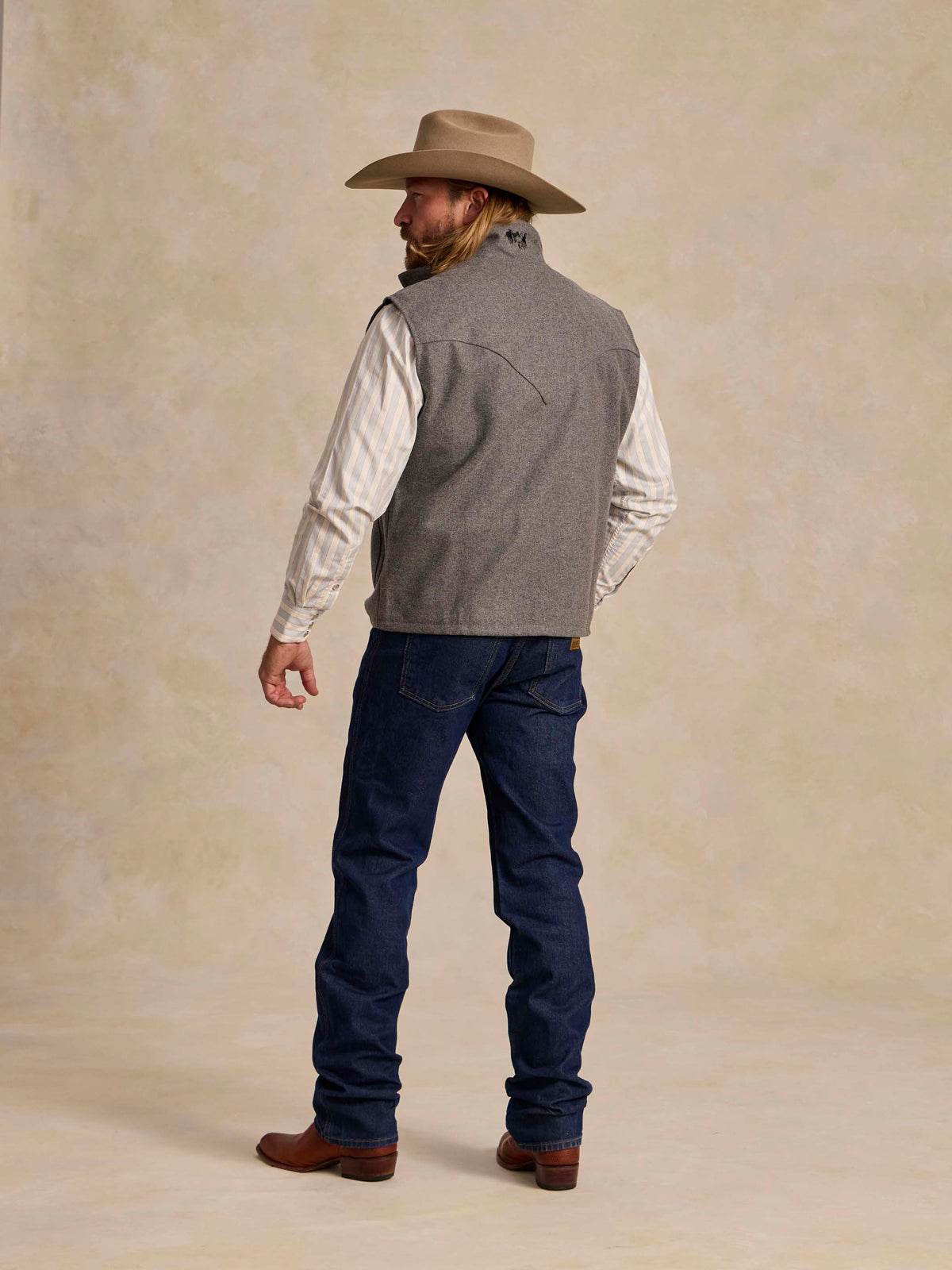 Heather gray wool vest, stand collar, full front zipper, layered with shirt sleeves