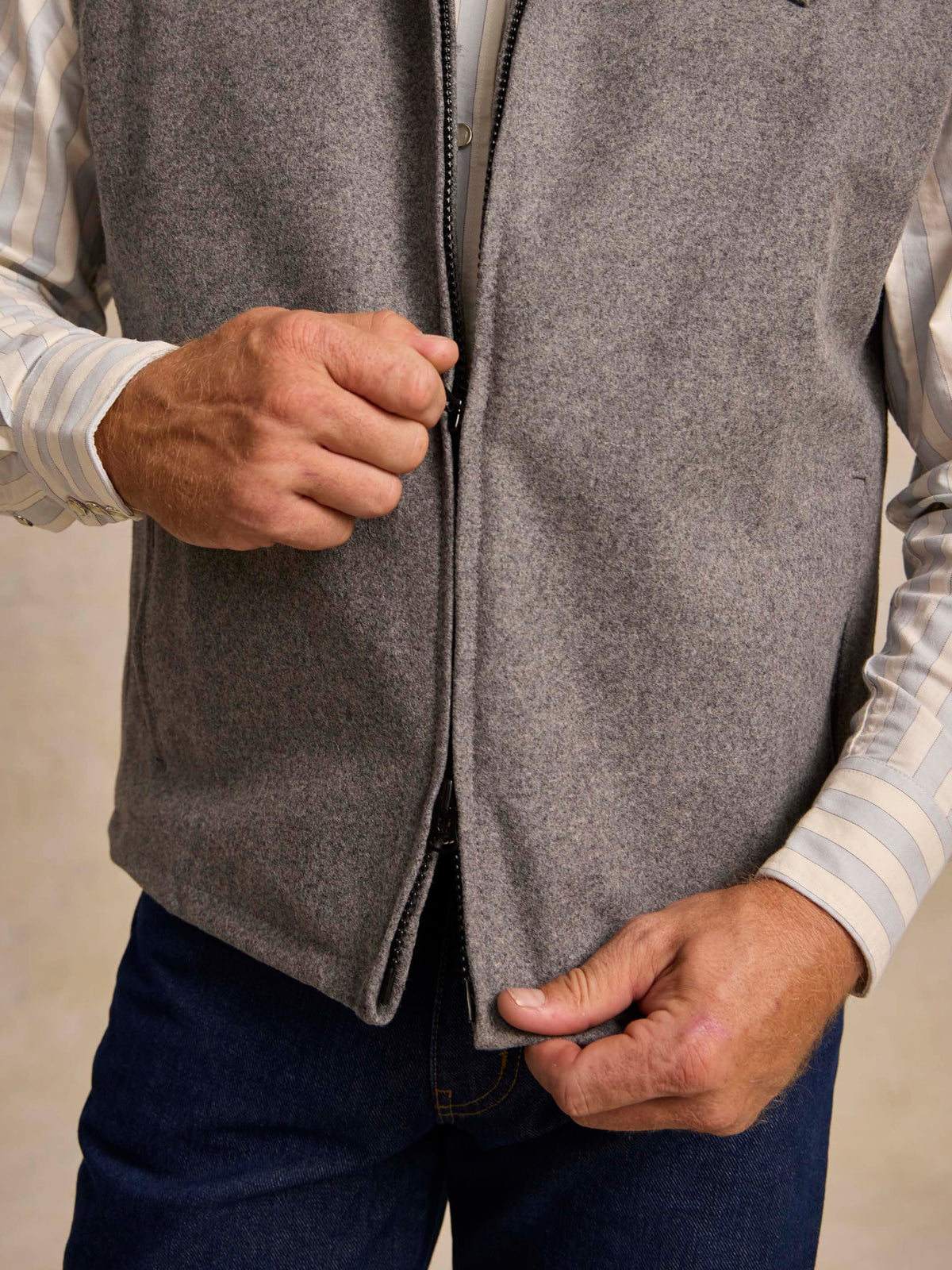 Heather gray wool vest close-up: full zipper front and textured knit