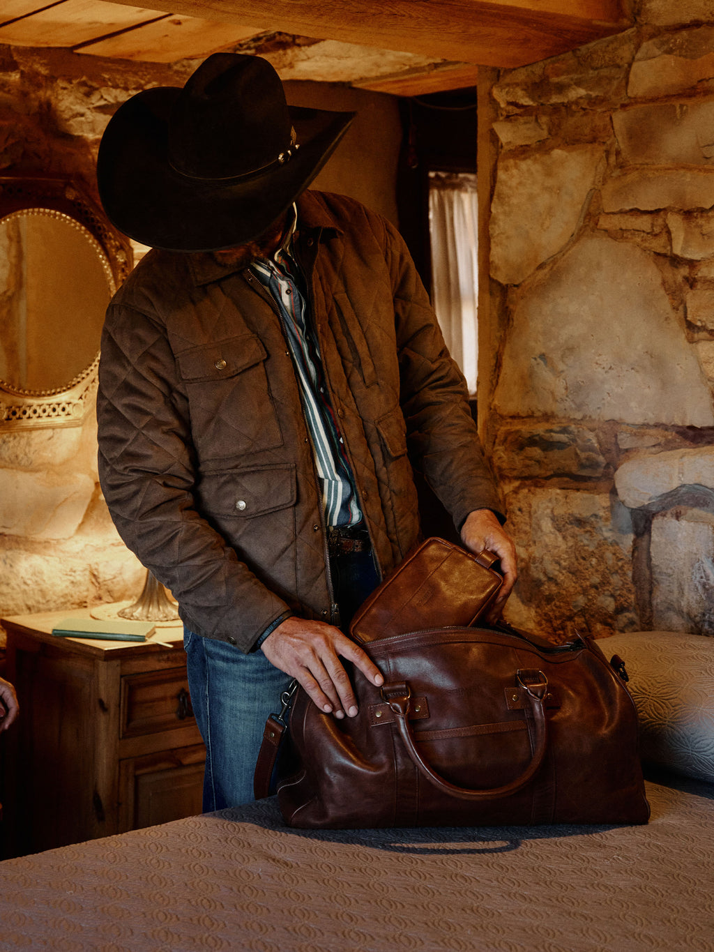 Brown quilted microsuede jacket with stand collar, flap pockets, and diamond quilting