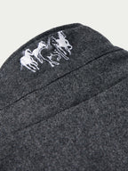 Charcoal wool coat shoulder with white embroidered horse logo