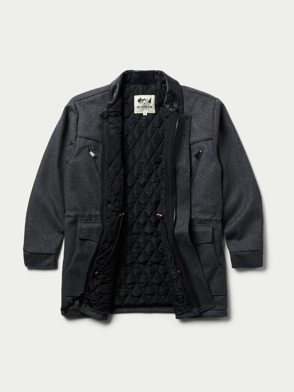 Charcoal wool coat with black quilted lining, zip front, side pockets