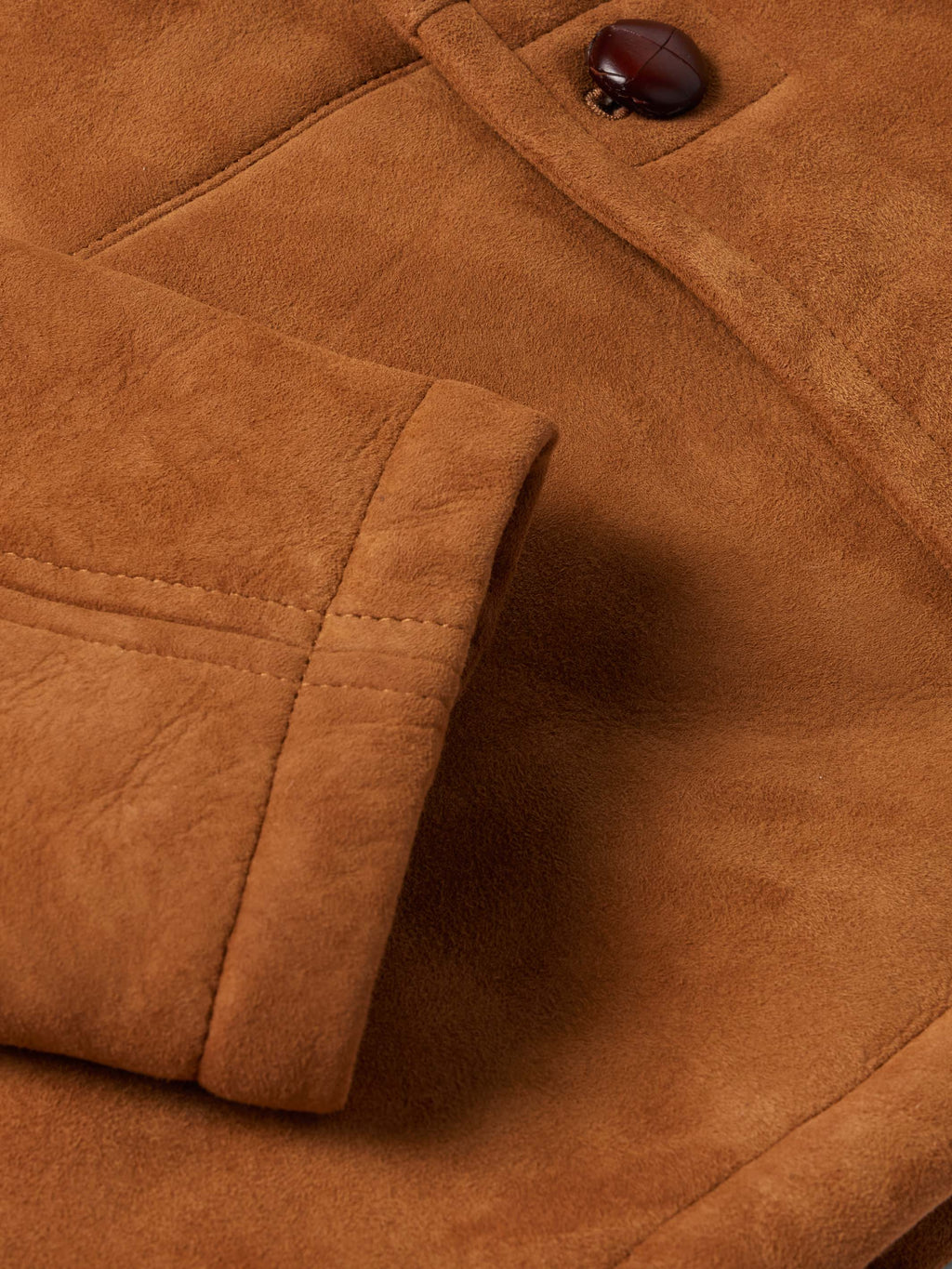 Buckskin suede coat with quilted yoke seam and padded front panel