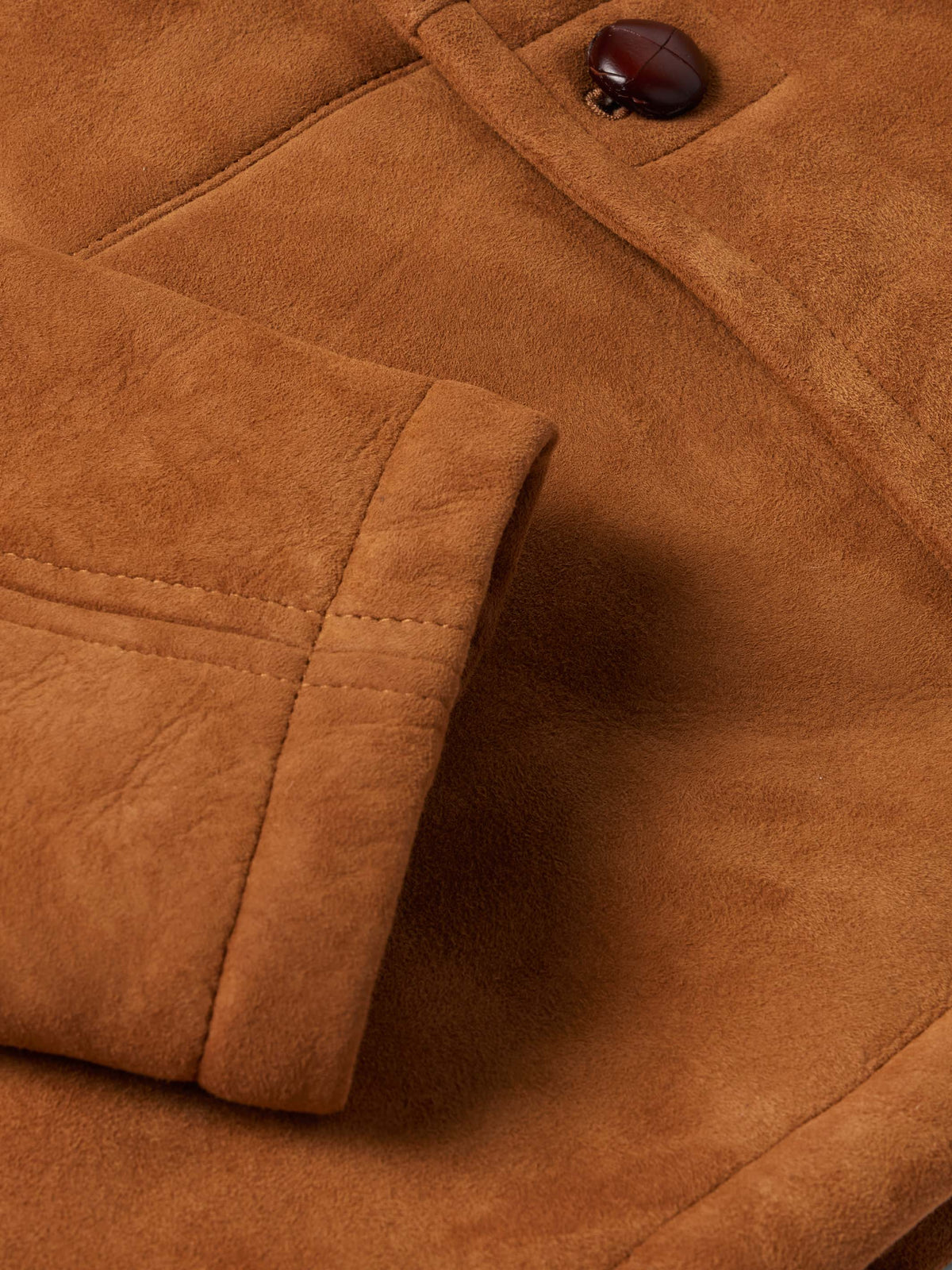 Buckskin suede coat with quilted yoke seam and padded front panel