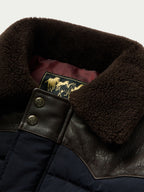 Brown leather trim and sherpa collar detail with gold-tone snap hardware