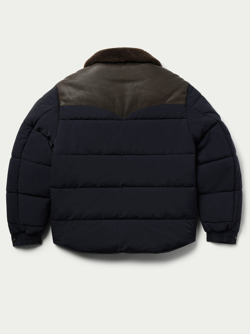 Navy puffer jacket with brown sherpa collar and snap front, rear view