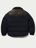 Navy puffer jacket with brown sherpa collar and snap front, rear view
