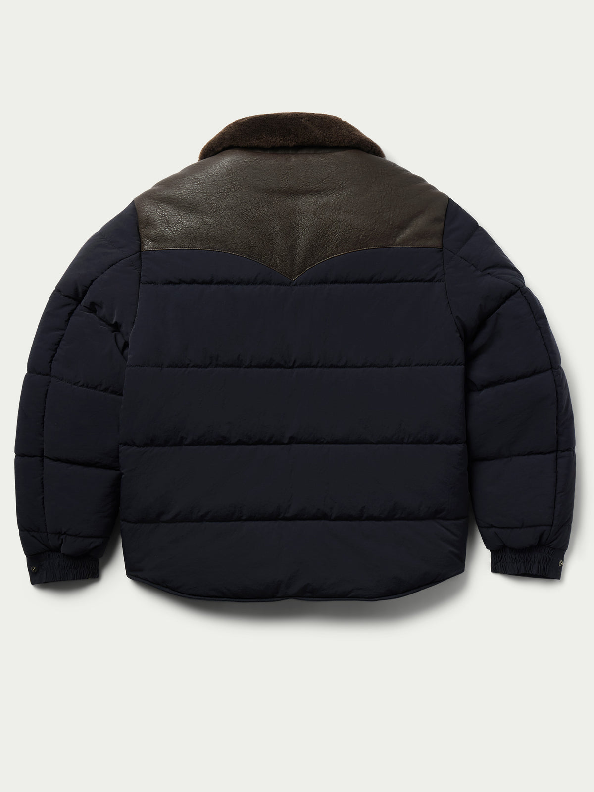 Navy puffer jacket with brown sherpa collar and snap front, rear view