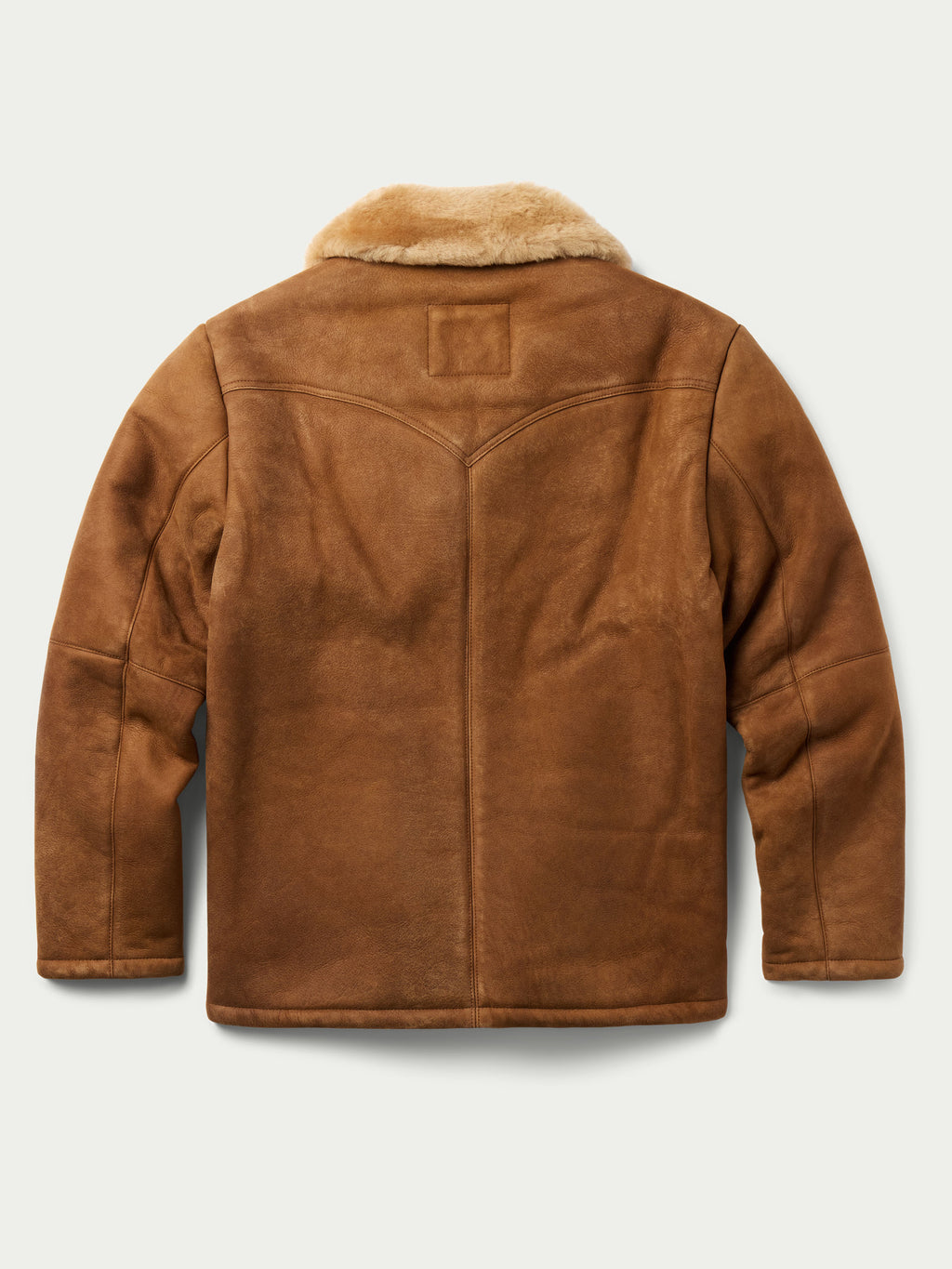 Brown shearling coat, stand collar and snap front; back view with stitched panel.