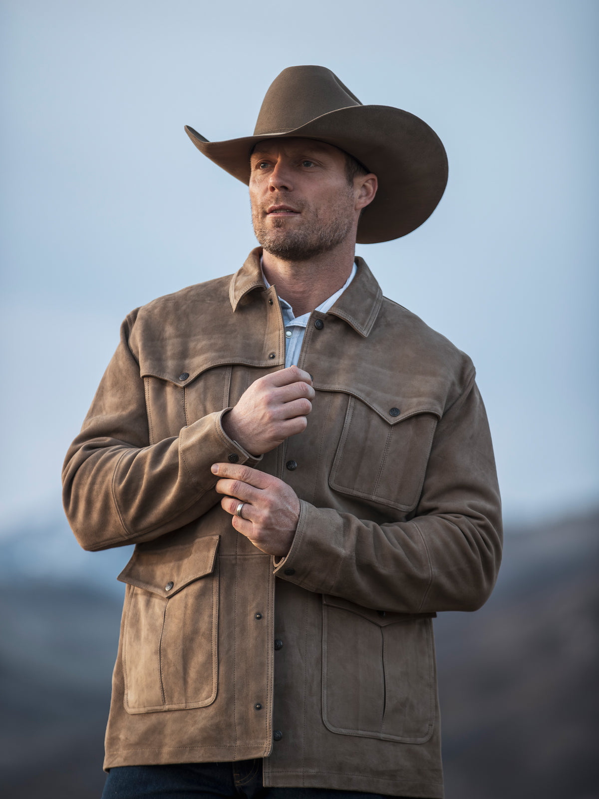 Desert tan suede shirt jacket with button front and flap chest pockets