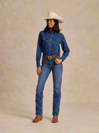 Women's medium-indigo western denim pearl-snap shirt with pointed yoke and chest pockets