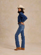 Women's medium-indigo western denim pearl-snap shirt, long sleeves, snap-front yoke