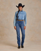 Light wash denim western snap shirt with pearl button closure and chest pockets