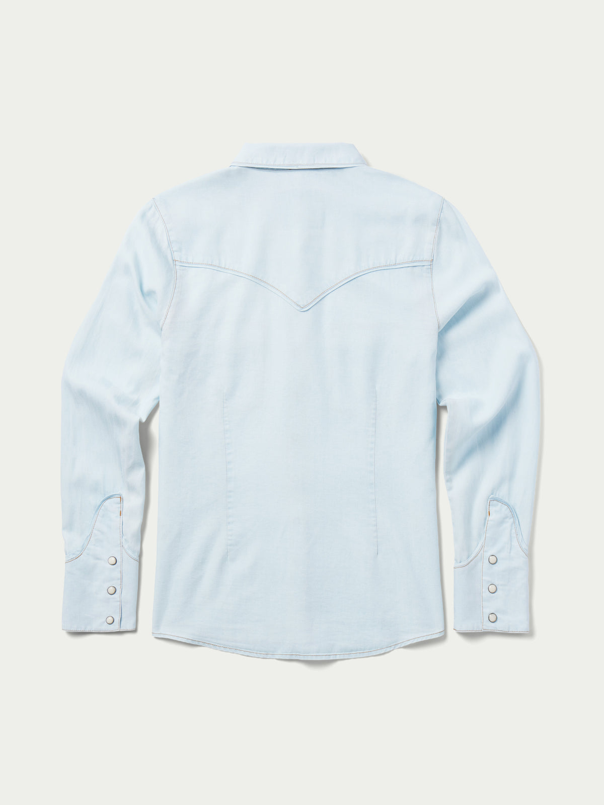 Light wash denim snap western shirt, back view with yoke and two flap pockets