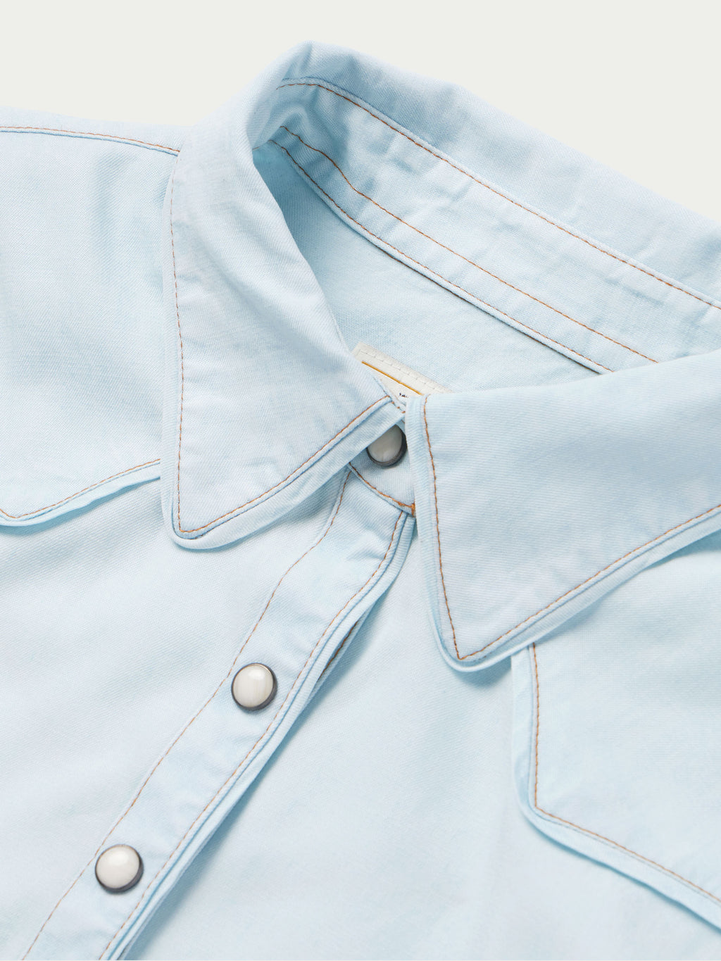 Light wash denim snap western shirt collar with snap placket and topstitched seams