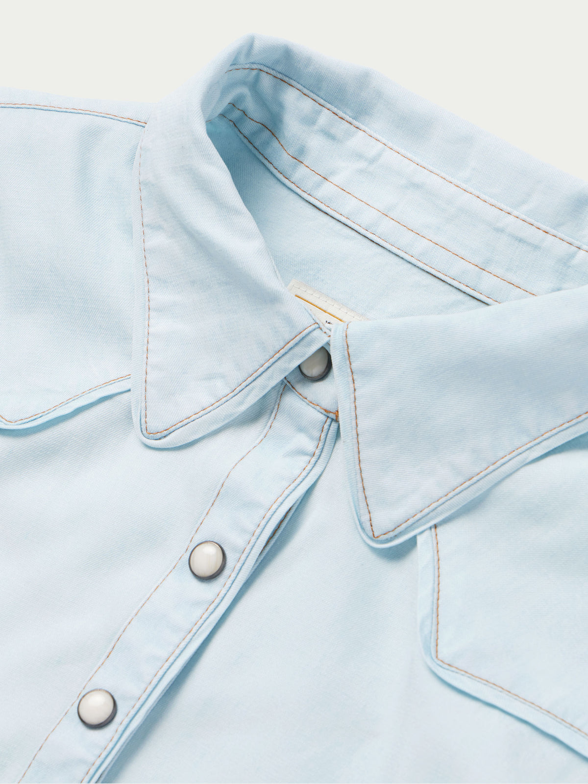Light wash denim snap western shirt collar with snap placket and topstitched seams