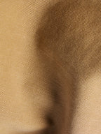 Faded chestnut denim shirt fabric texture close-up