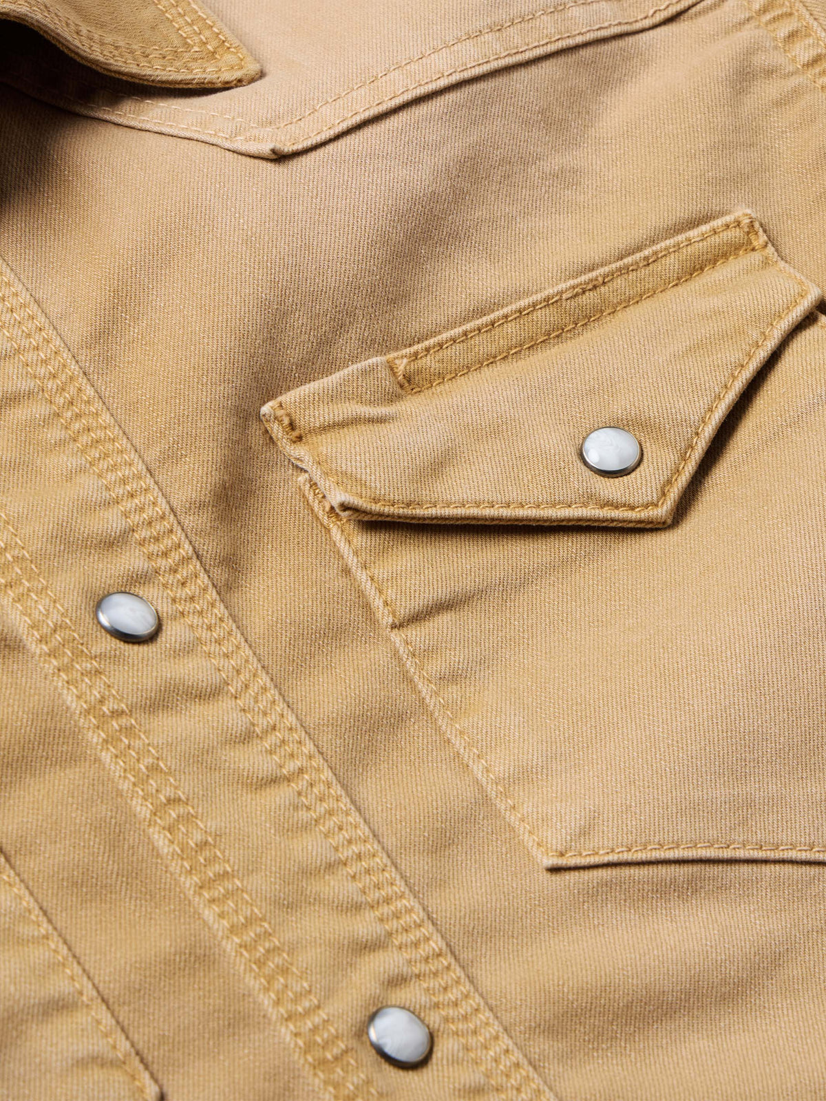 Faded chestnut western snap shirt detail with chest pocket and metal snap button