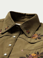 Chestnut-brown embroidered snap shirt with pointed collar and silver snap front