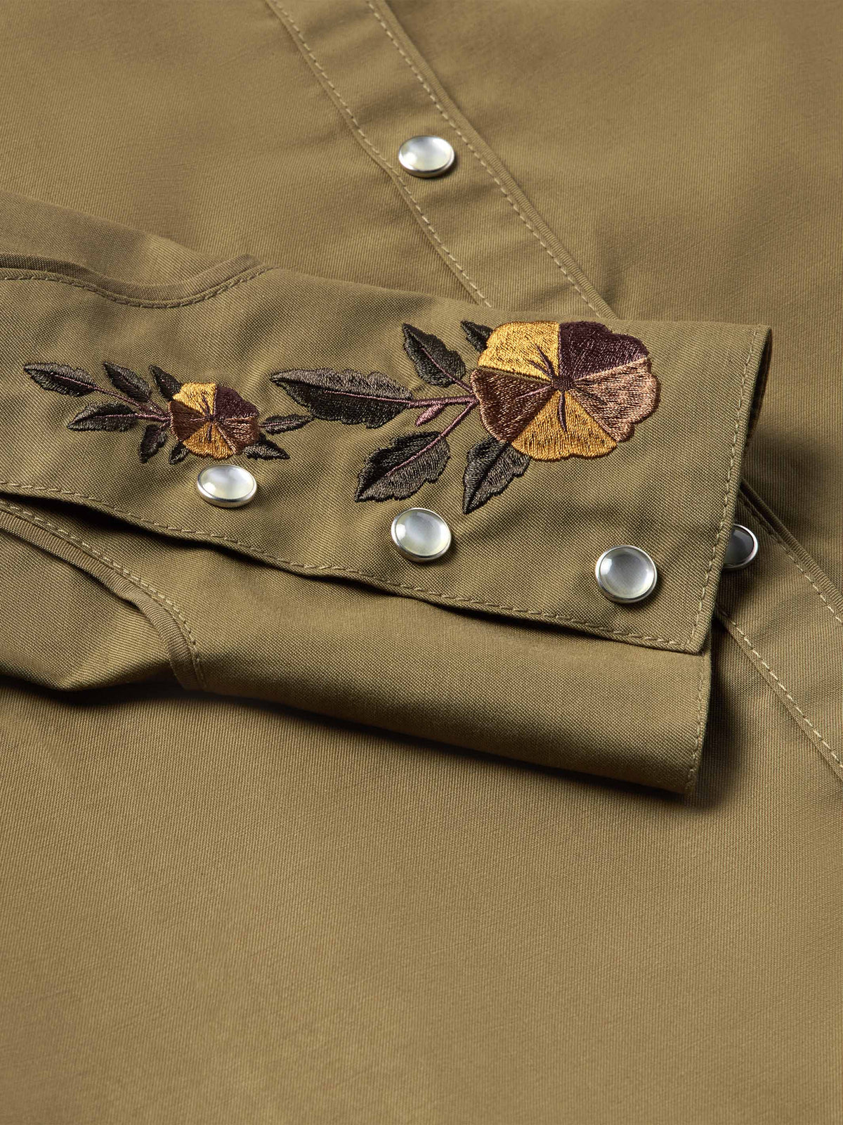 Chestnut-brown snap shirt with floral embroidery across chest and silver snaps