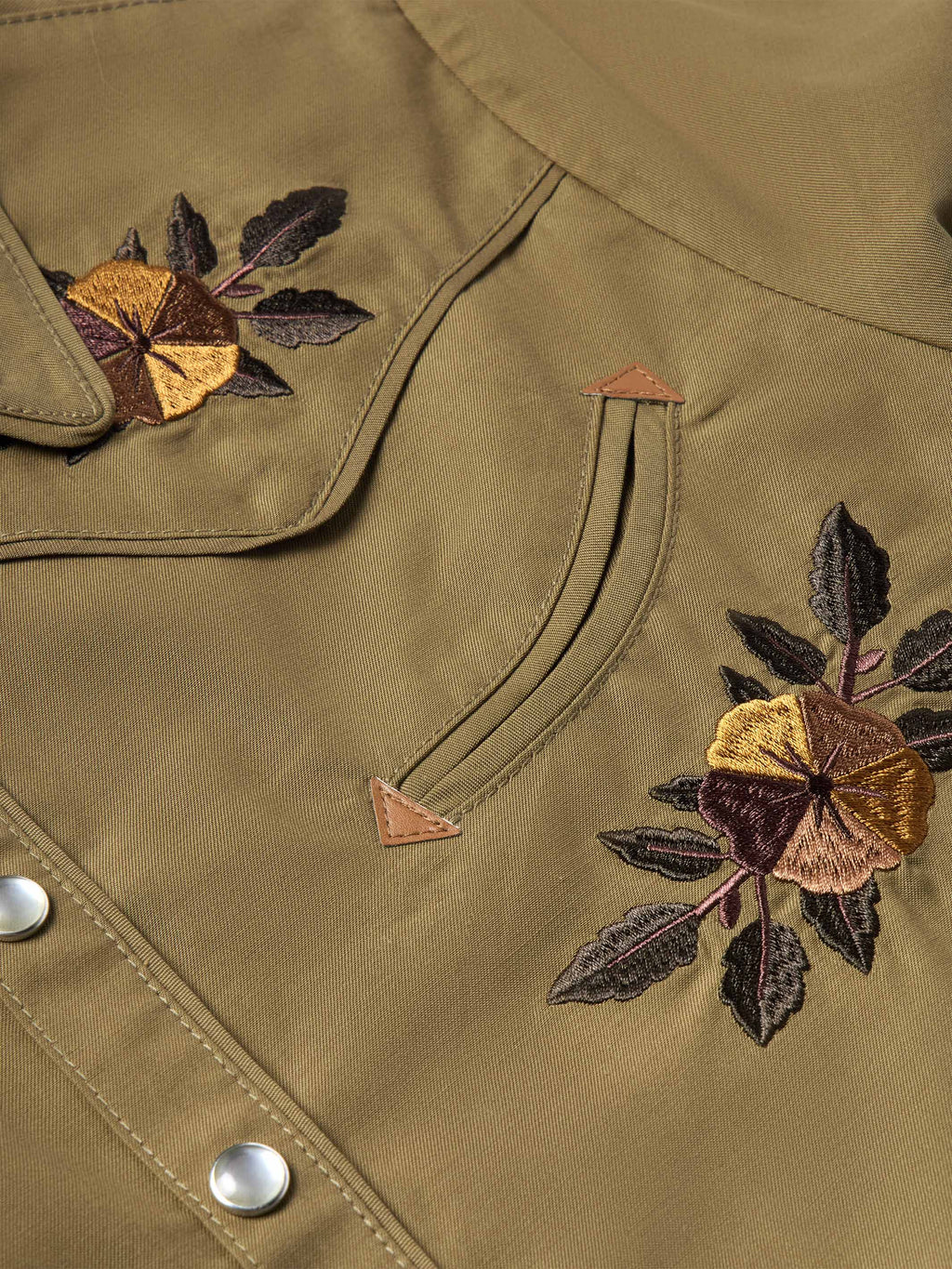 Chestnut-brown embroidered snap shirt collar and pocket yoke with floral thread details