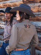 Chestnut-brown embroidered snap shirt on model, back view, long sleeves and stand collar