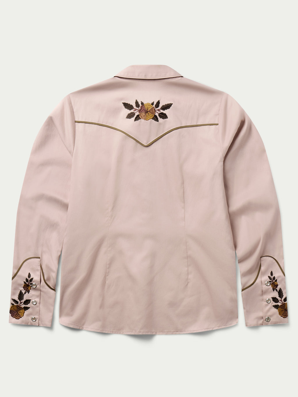 Women’s embroidered snap shirt in desert rose pink with floral chest and sleeve cuffs