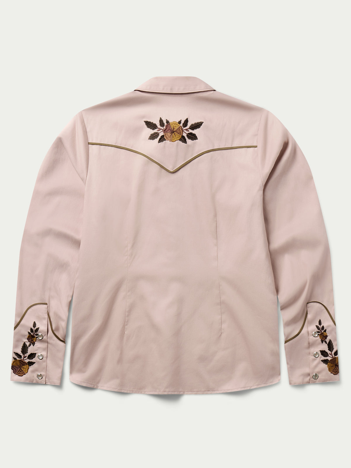 Women’s embroidered snap shirt in desert rose pink with floral chest and sleeve cuffs