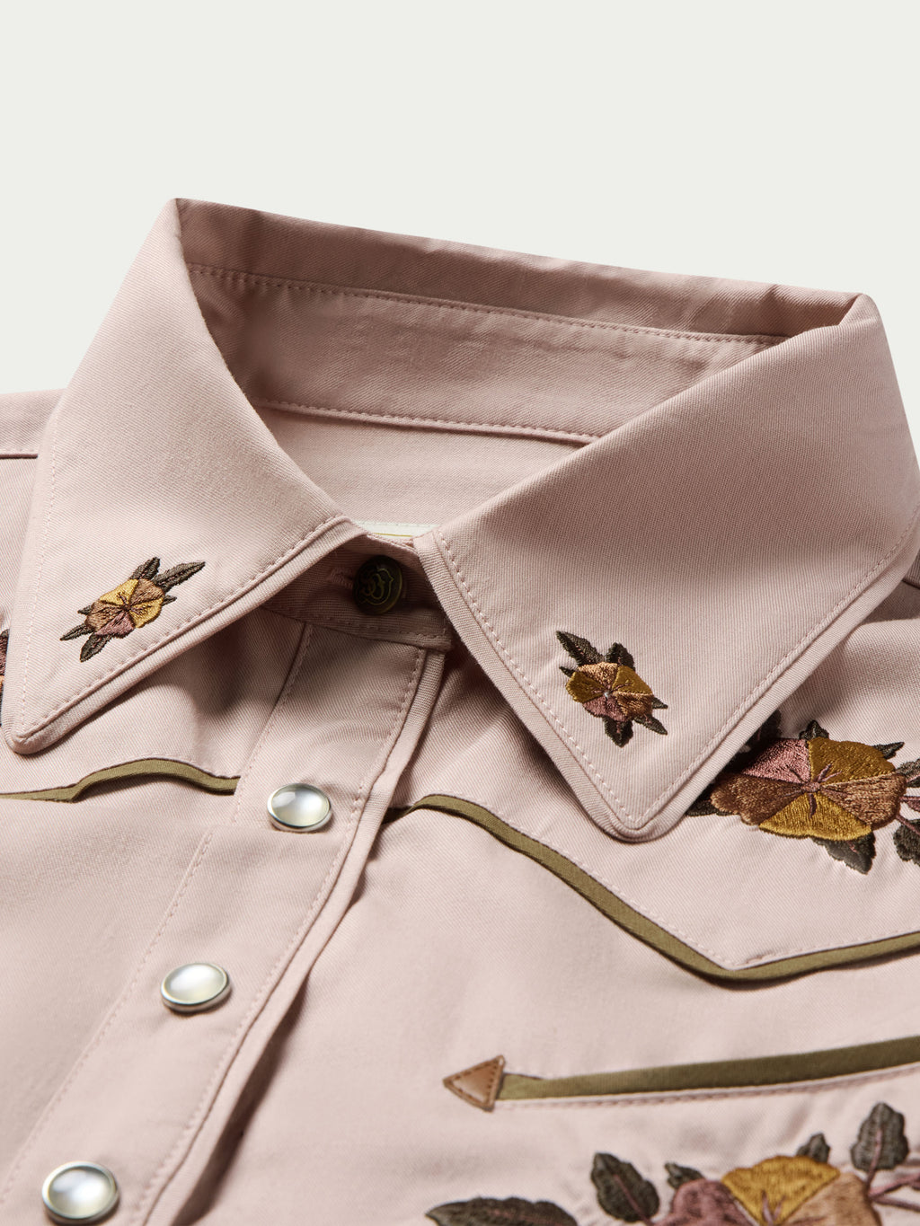 Desert rose snap-front shirt with embroidered collar, placket, and metal snap buttons