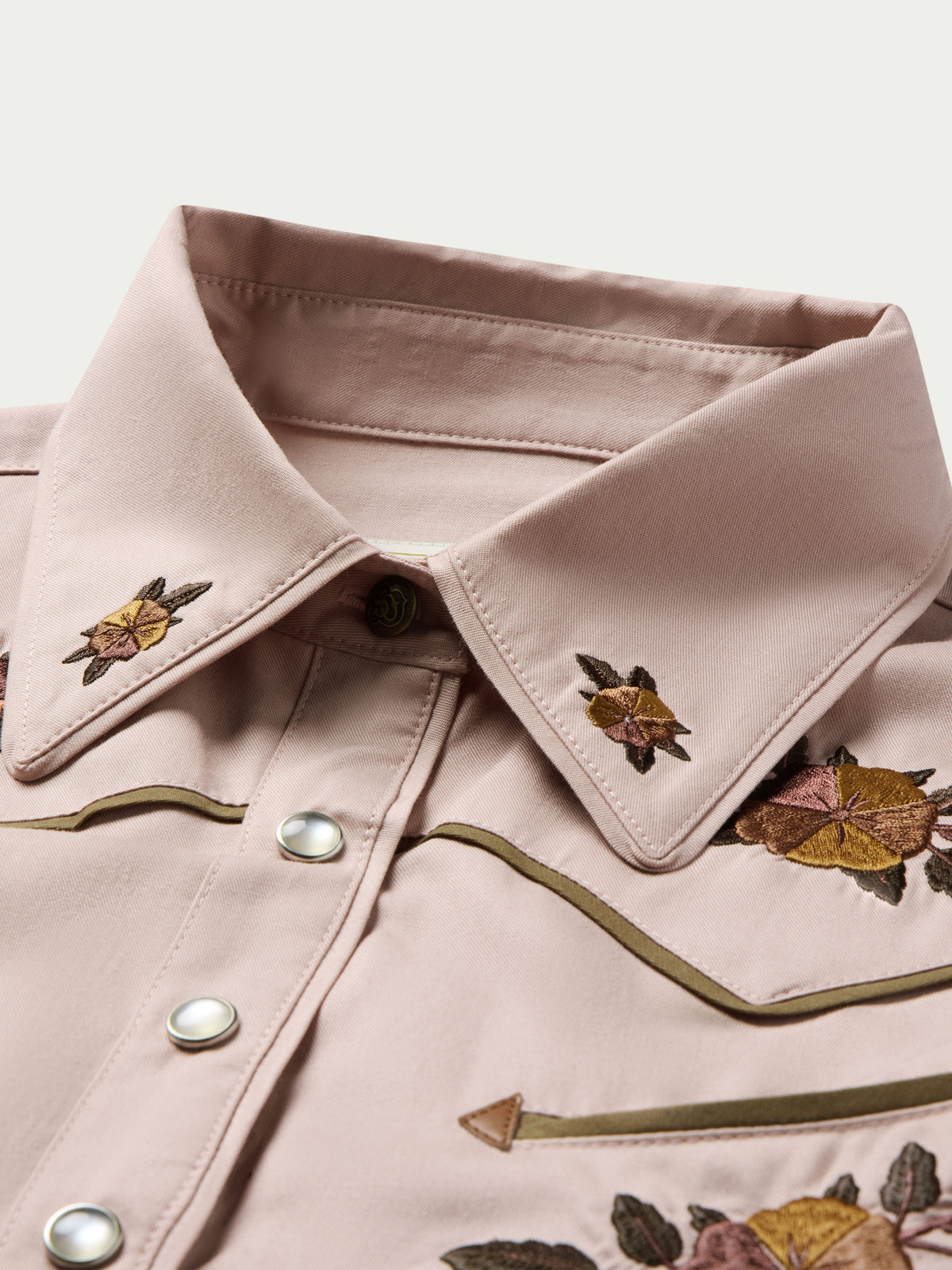 Desert rose snap-front shirt with embroidered collar, placket, and metal snap buttons