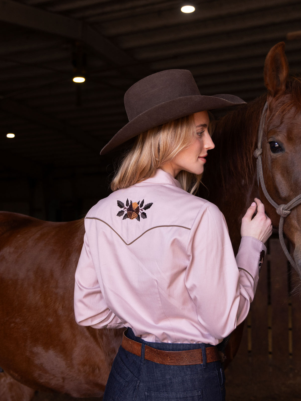 Light pink embroidered snap shirt with floral yoke detail and long sleeves