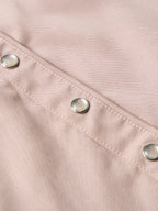 Desert rose shirt close-up of seam and silver snap buttons on cuff placket