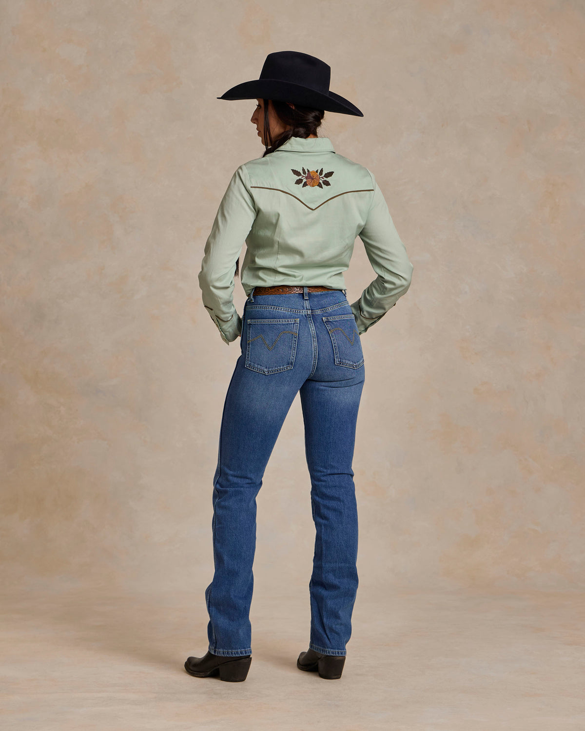 Jade embroidered snap shirt back view with floral detail at upper yoke